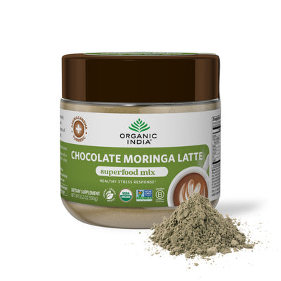 Organic chocolate moringa latte powder, superfood mix in glass jar