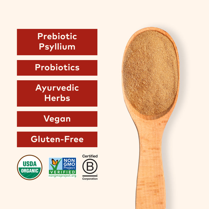 Scoop of Organic orange psyllium pre & probiotic fiber powder that is vegan and gluten free.