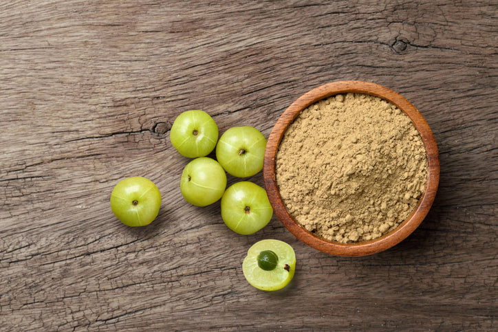 amla and amla powder on. a table