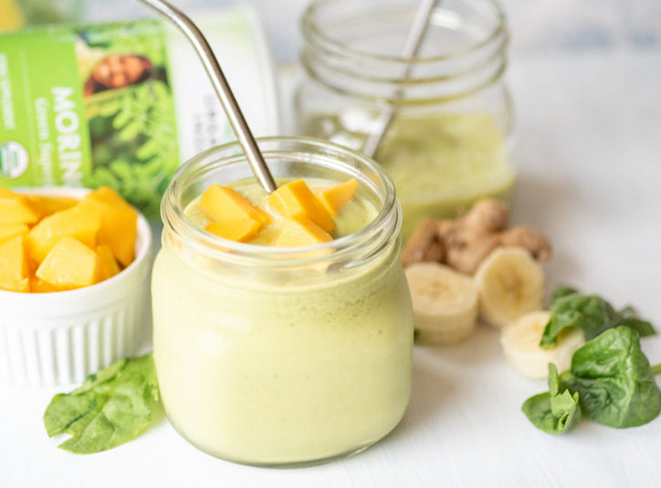 Indian superfood moringa featured in a smoothie with mango, banana and greens.